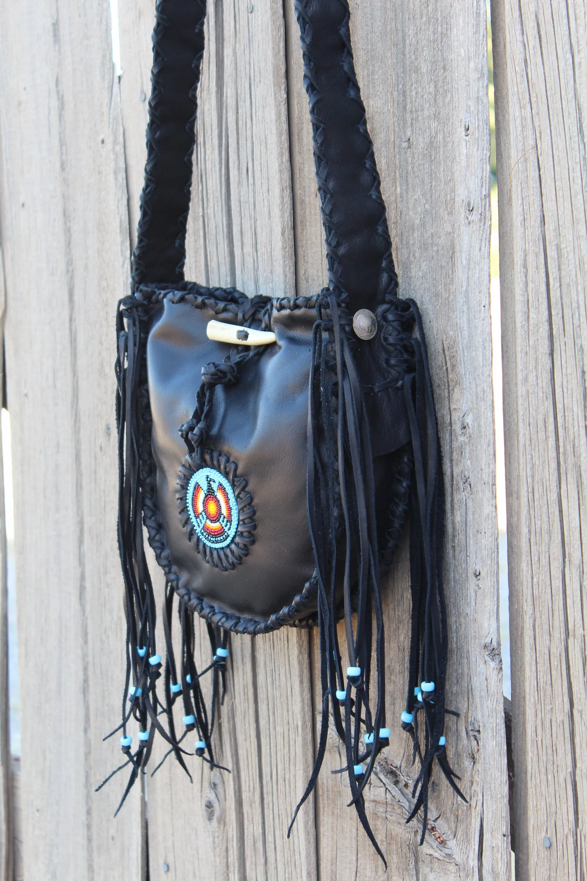 Black leather tote, beaded Thunderbird tote handbag