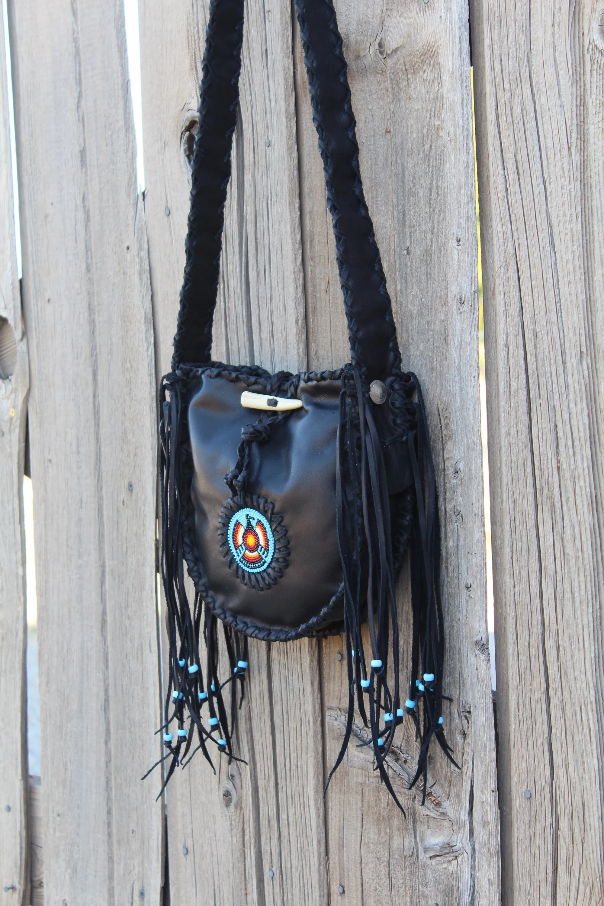 Black leather tote, beaded Thunderbird tote handbag