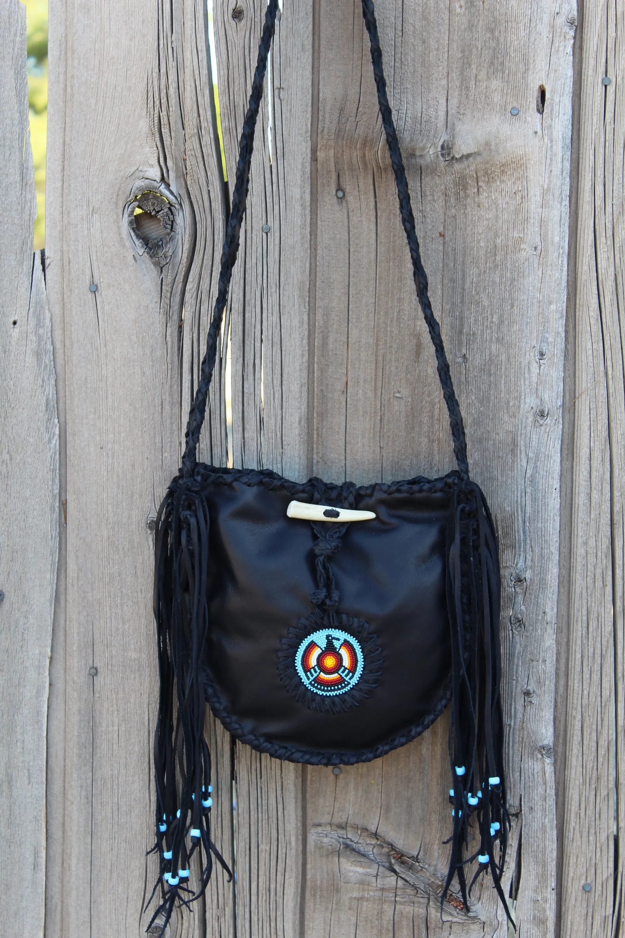 Black leather tote, beaded Thunderbird tote handbag