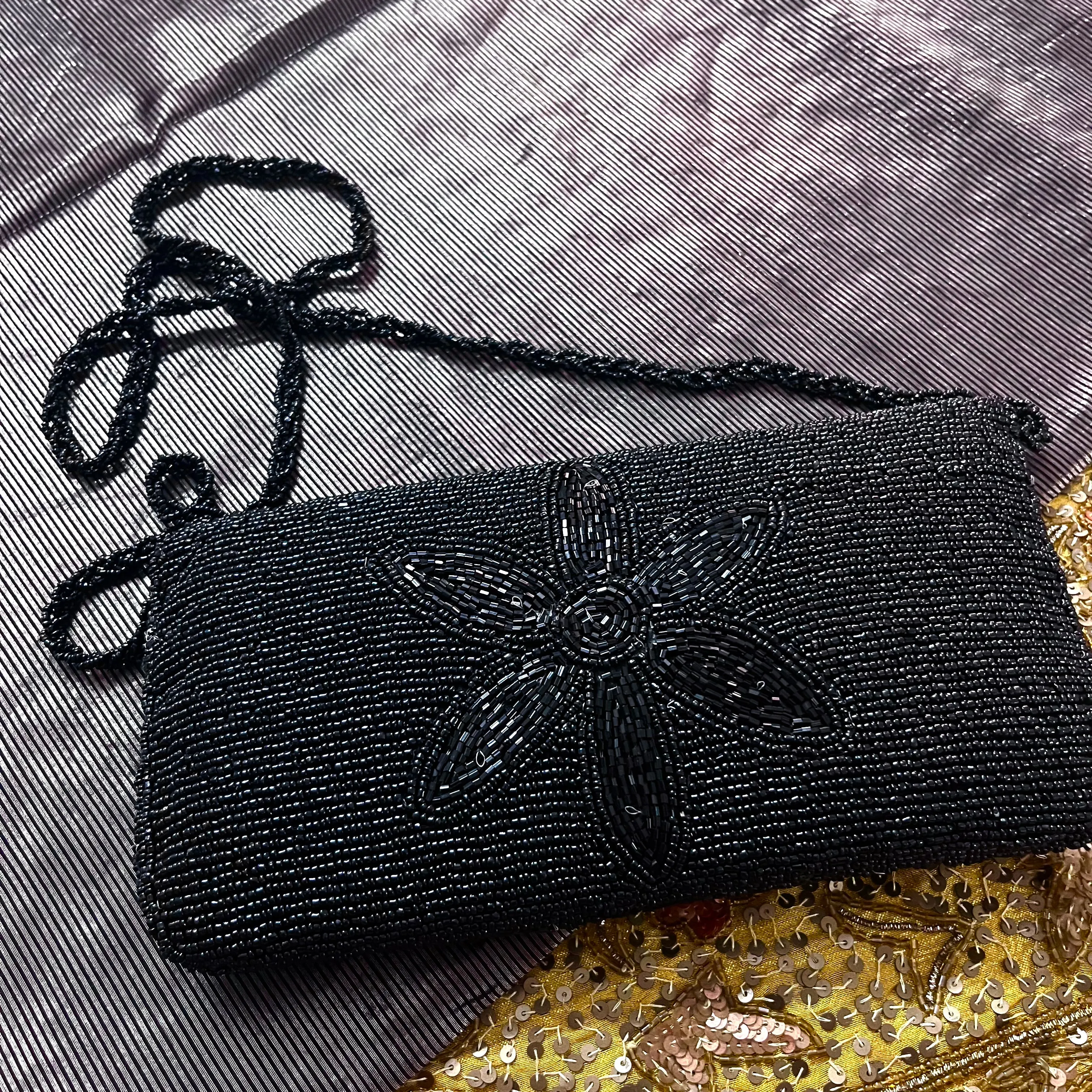 Black pearl embellished purse